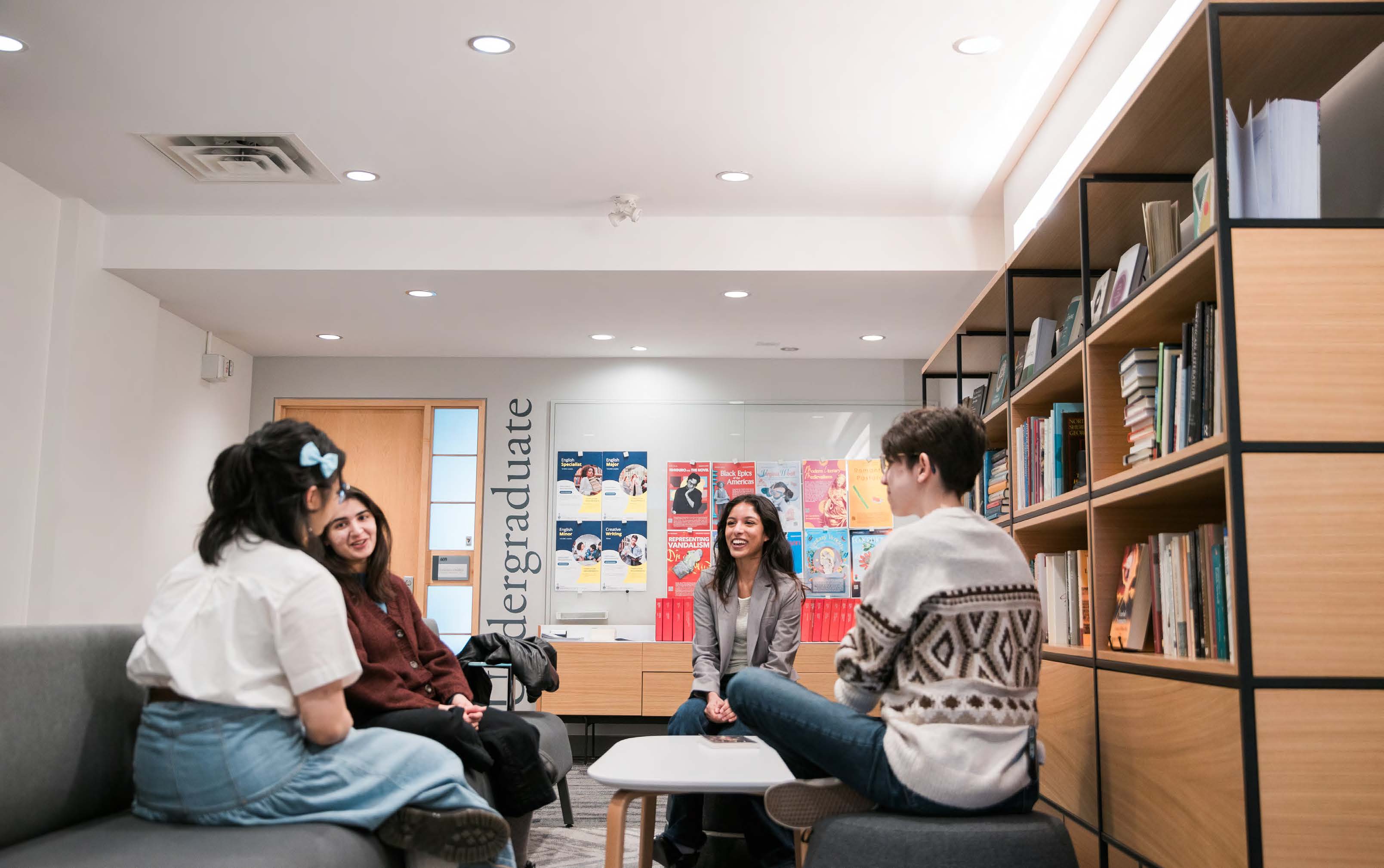 A group of students in the Department of English Lounge