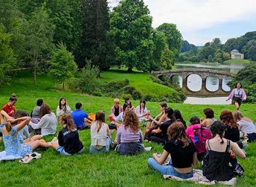 Students take a moment to enjoy the scenery at Stourhead Estate. 